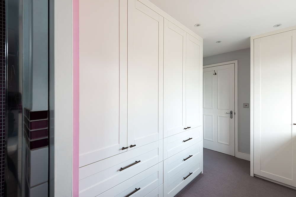 Custom made white wardrobe with 4 doors and drawers