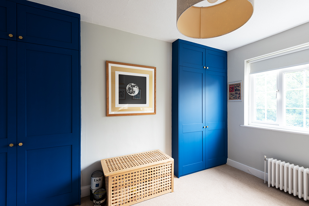 Bright blue fitted alcove wardrobes