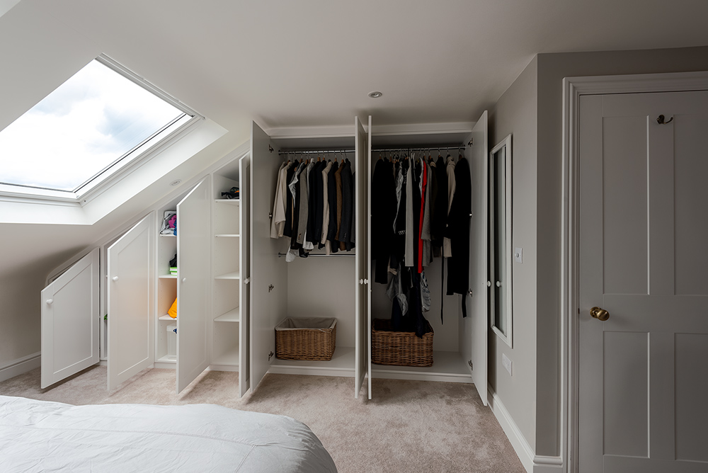 Inside a built-in loft wardrobe