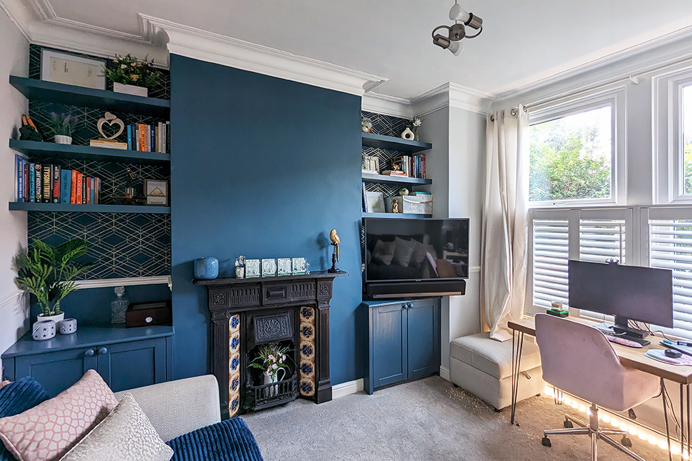 Blue alcove fitted units in living room