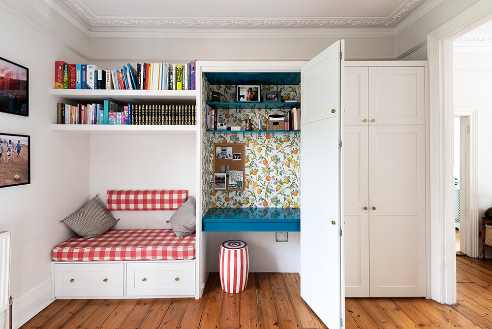 Built-in Cupboard with hidden desk and seating area.