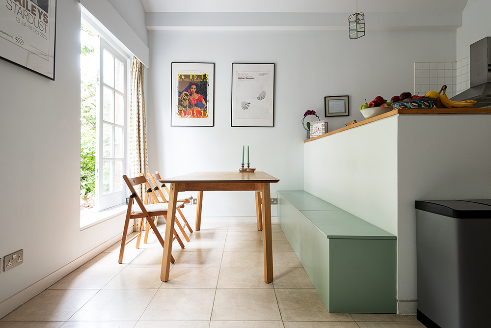 Large green kitchen storage bench. Built by Bespoke Carpentry London