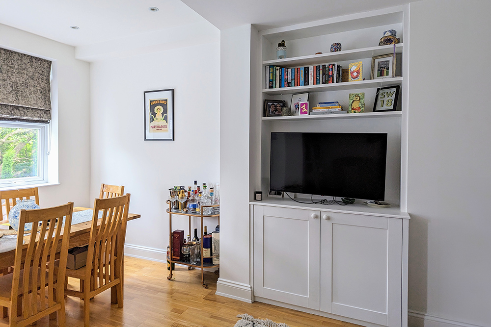 Fitted alcove cupboard with TV Unit