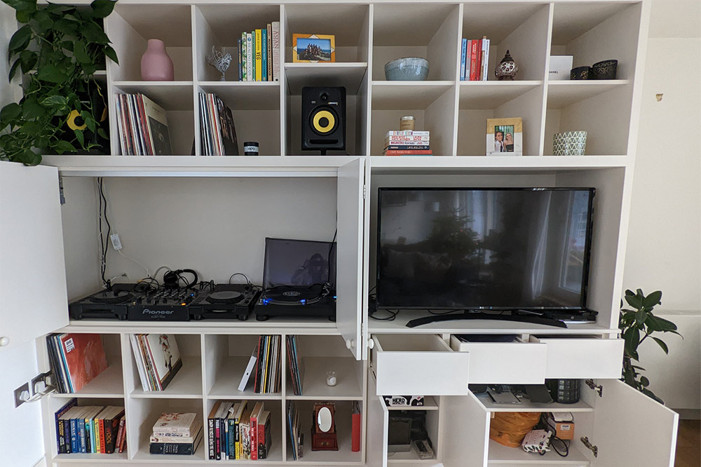 Inside a media unit with shelve to store decks