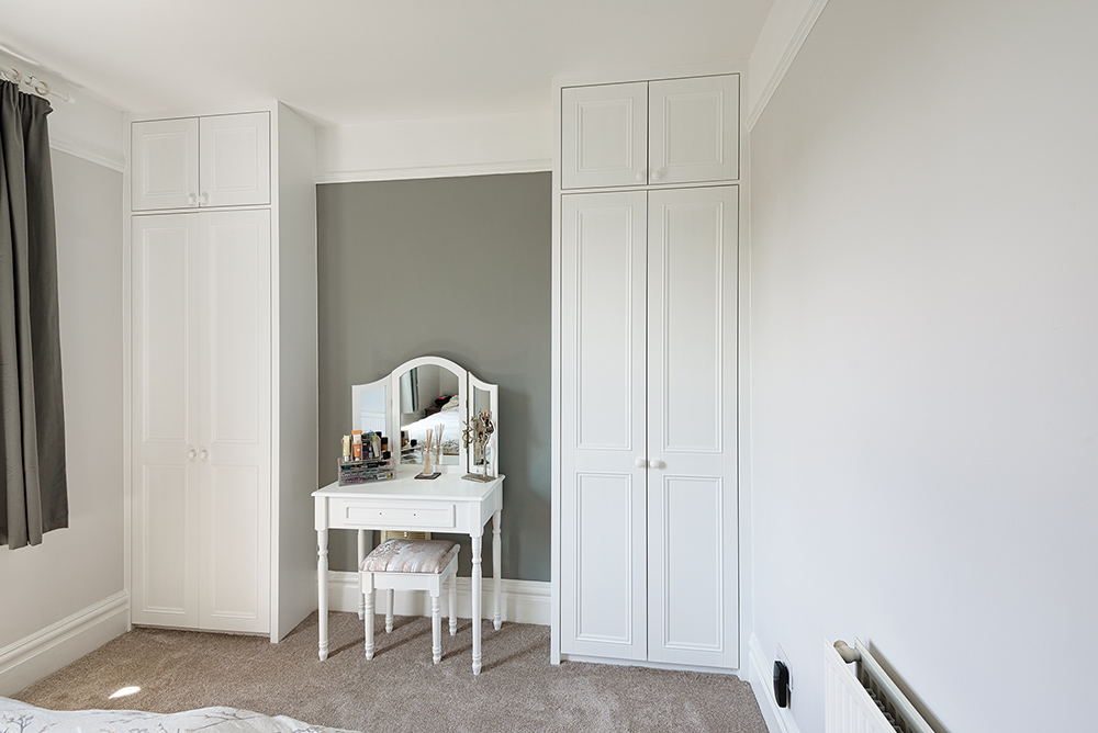 Fitted white alcove wardrobes