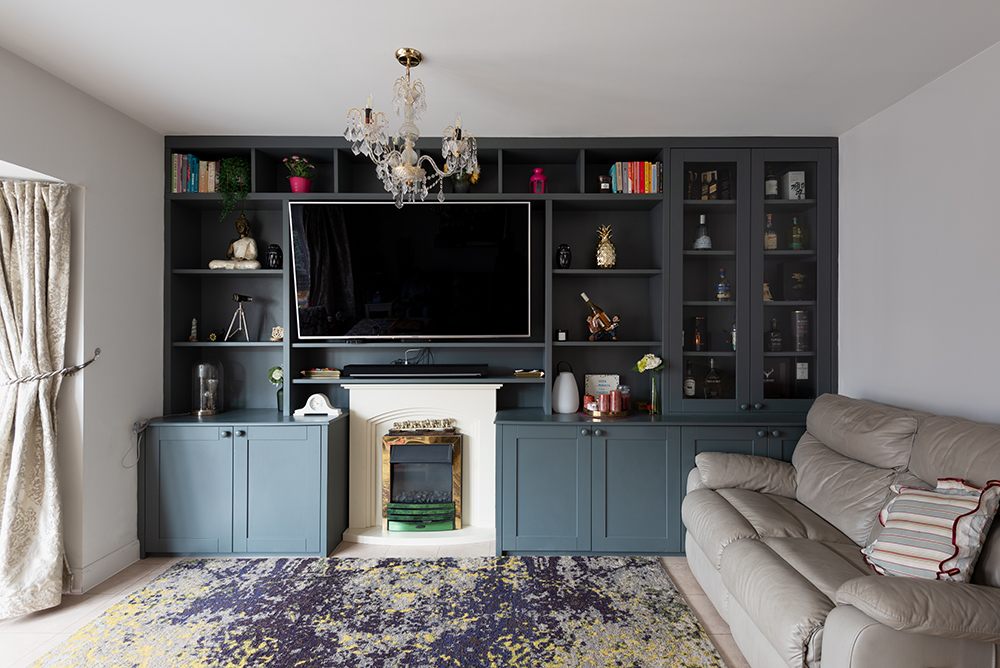 Built in TV unit with storage space. Designed and made by carpenters at Bespoke Carpentry London.