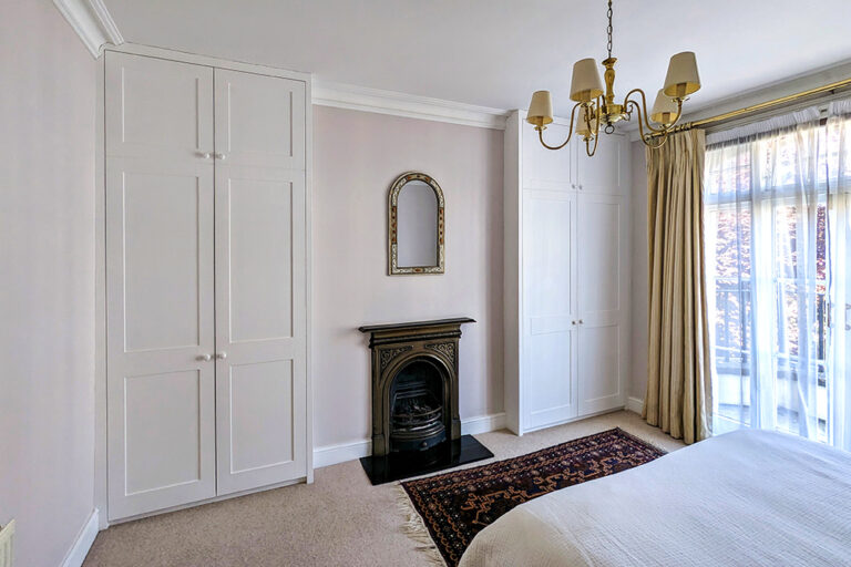 Fitted white alcove wardrobes, made with MDF