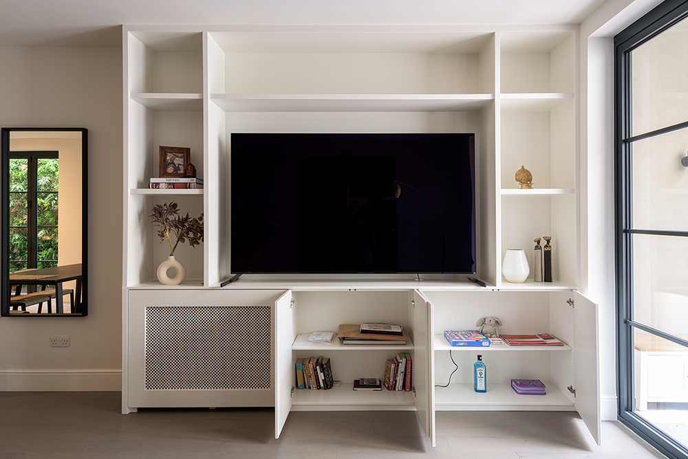 White fitted media unit with drawes
