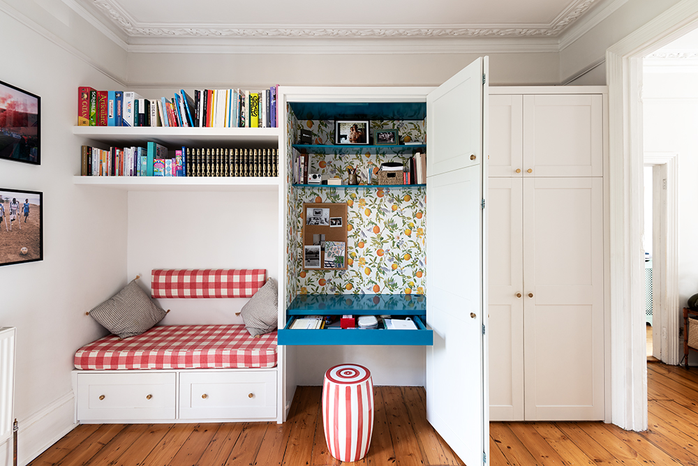 Built in multi functional furniture, seating, bookshelf, hidden desk and wardrobe..