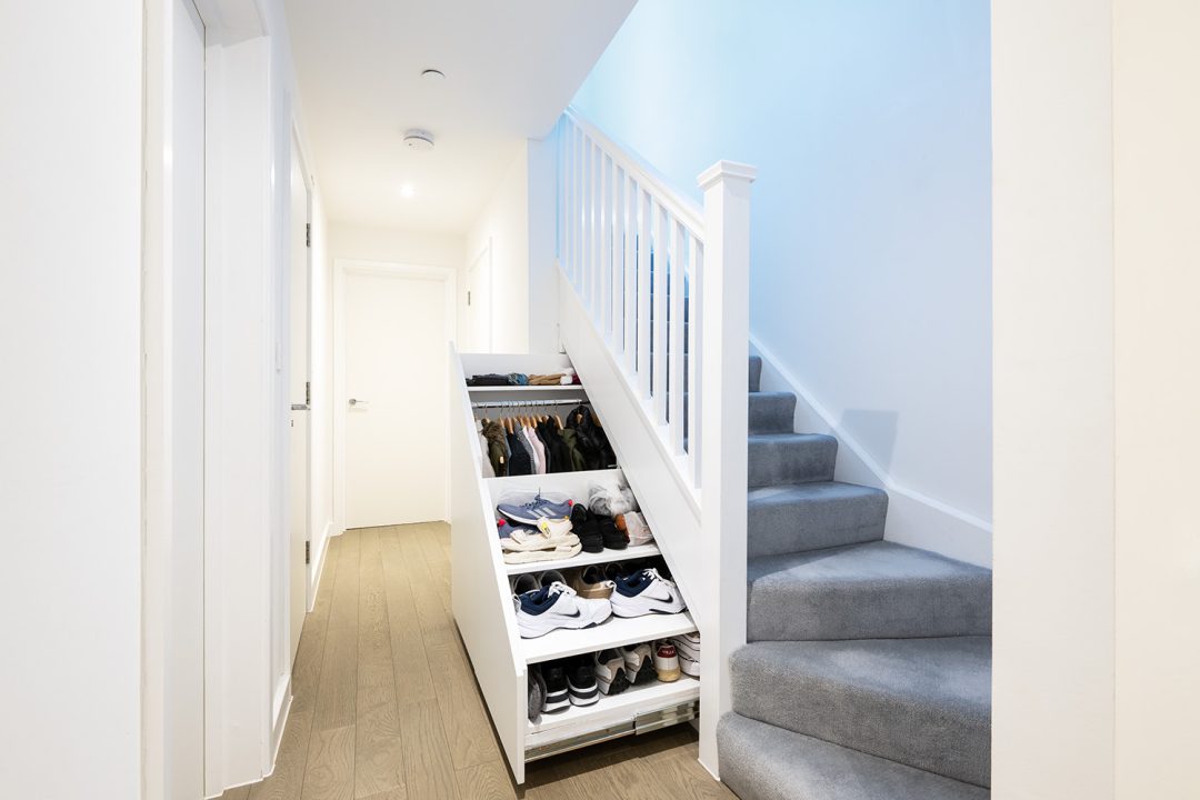 Under stairs storage with pull out drawer to put shoes