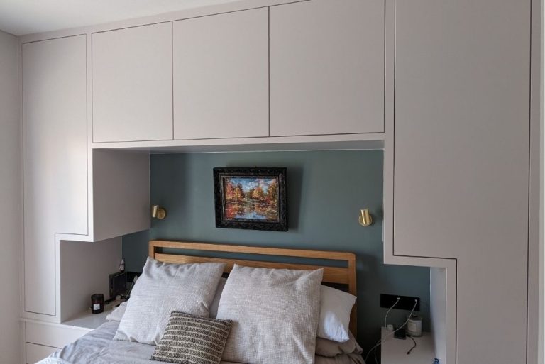 Fitted over the bed wardrobe, made with MDF and hand-painted.