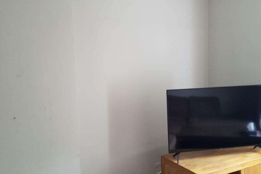 Before picture of a living room in Stockwell