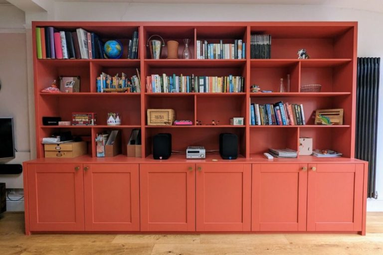 After picture of a built in red dining room bookcase in Tulse Hill