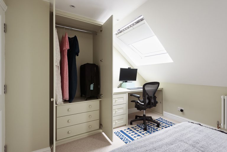 Bespoke multi functional wardrobe with desk. Designed and built from carpenters at Bespoke Carpentry London.