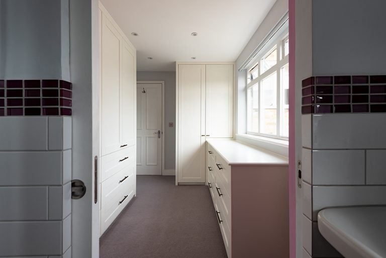 Bespoke hallway wardrobes. Designed and installed by carpenters at Bespoke Carpentry London