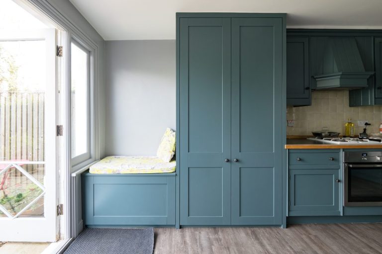 Built in kitchen cupboards and storage seating