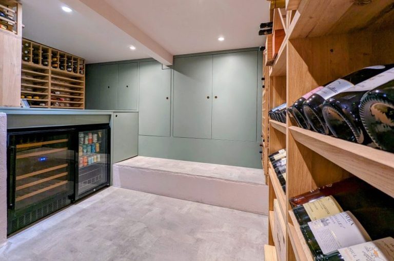 Built in basement storage with wine cellar, fridge and pantry