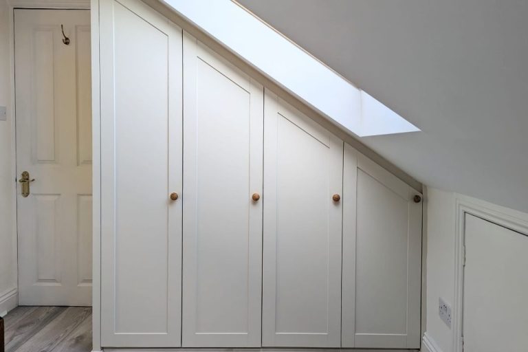 4 door bespoke slanted wardrobe. Designed by carpenters at Bespoke Carpentry London