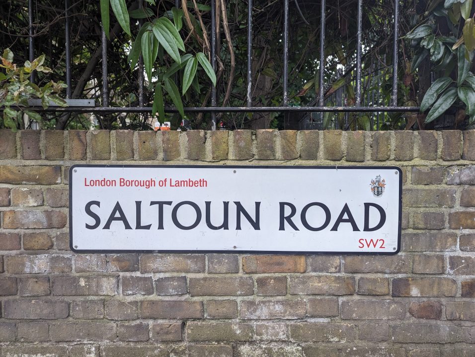 Street name on brick wall in SW9 called Saltoun Road