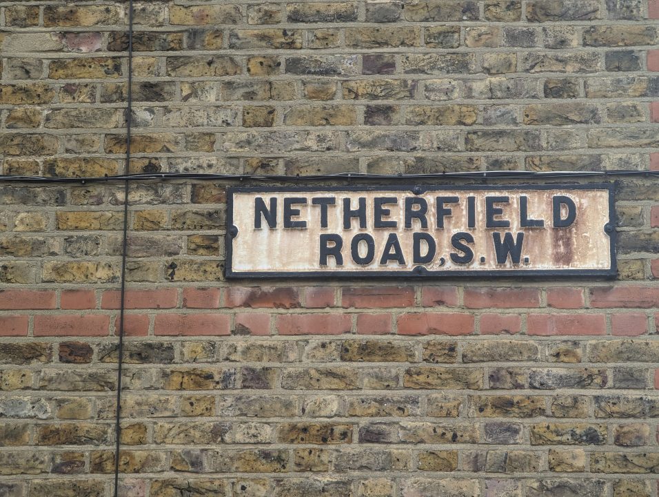 Old sign on a brick wall in Tooting