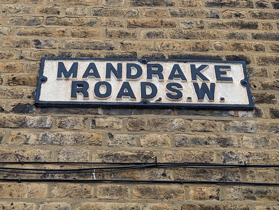 Street sign on a wall in Tooting