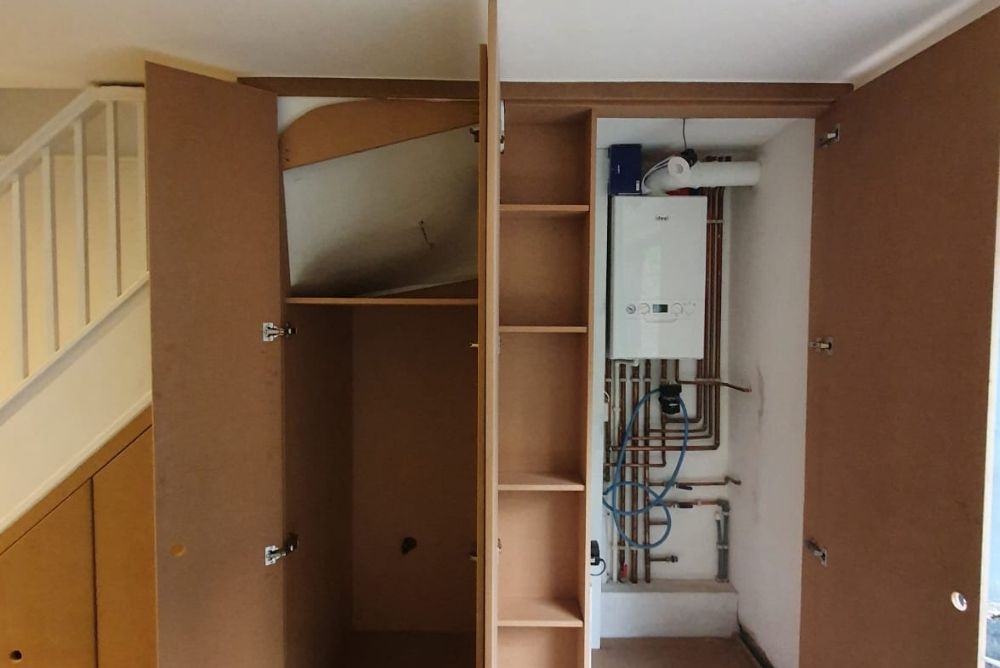 Under stairs cupboard to hide boiler