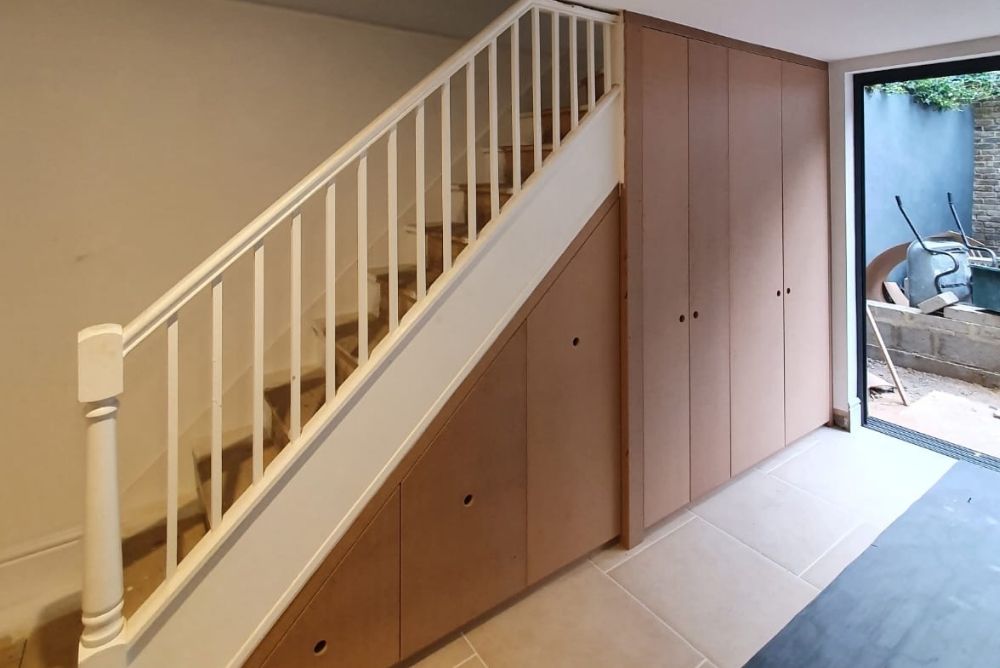 Fitted under stairs cupboards made with MDF