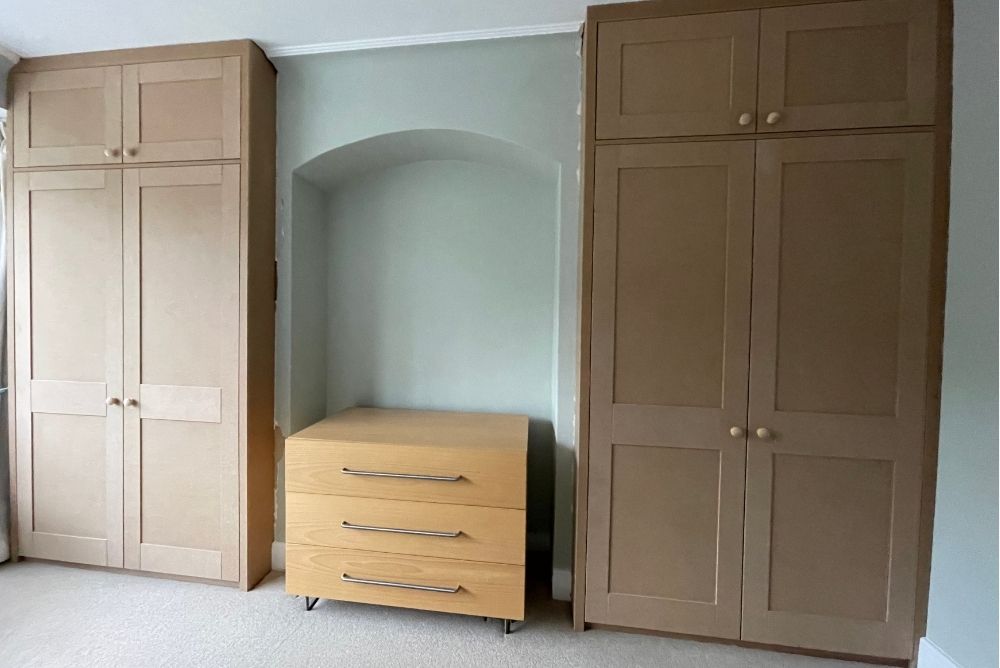 Two fitted alcove wardrobes, made with MDF