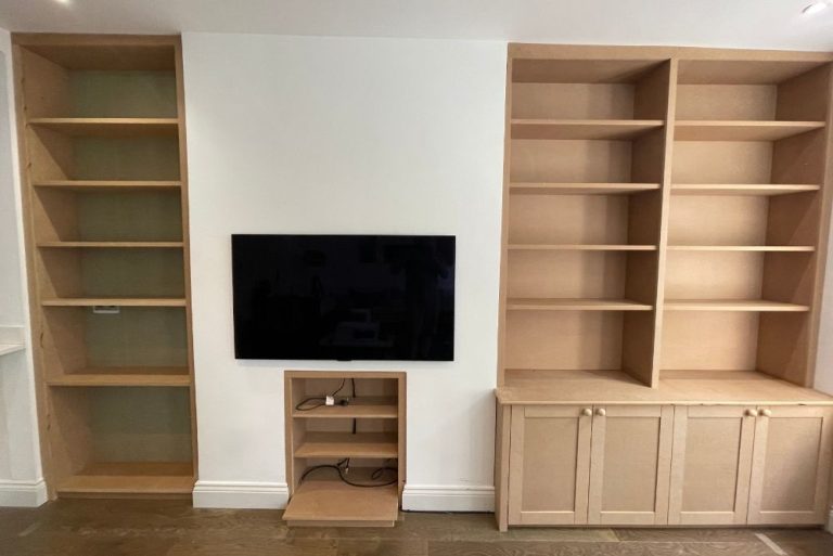 Fitted alcove shelving in living room