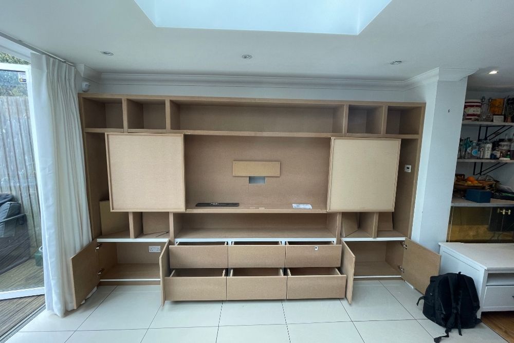 Wall to wall TV unit