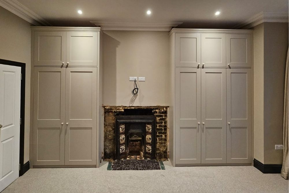 Grey painted alcove wardrobes