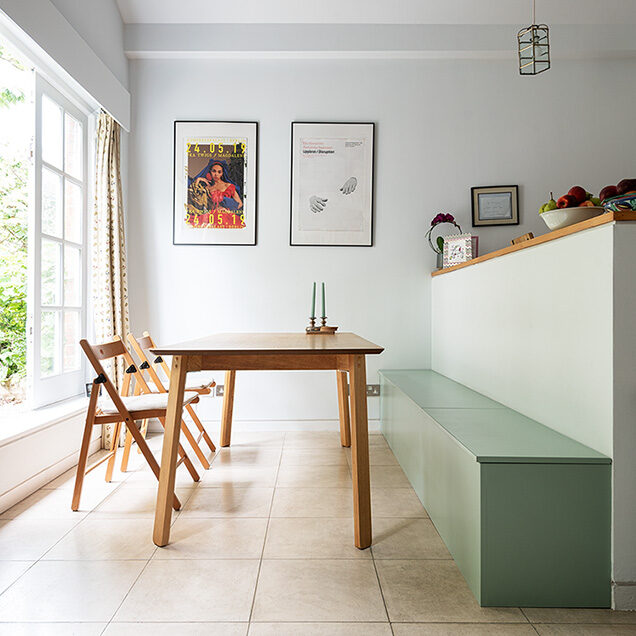 Built-in kitchen storage bench in green,